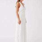 Island dress in white. Maxi length with tie at bust.