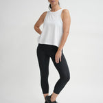 Organic cotton white singlet with cut in arms and swing hem