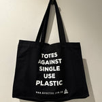 We are totes against single use plastic.  Recycled shopping bag